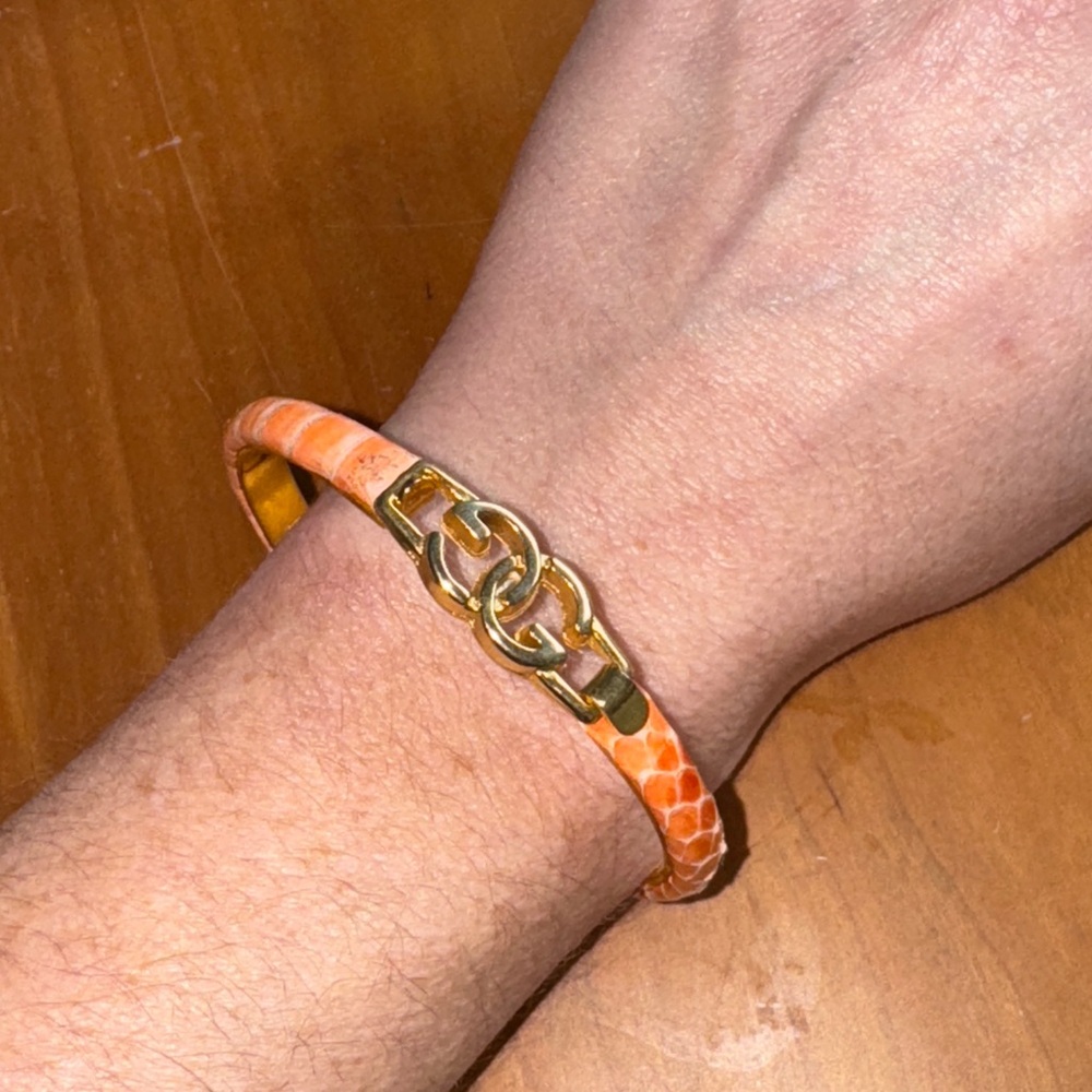 Vintage gucci snakeskin bracelet.   24k gold plated, peach snakeskin